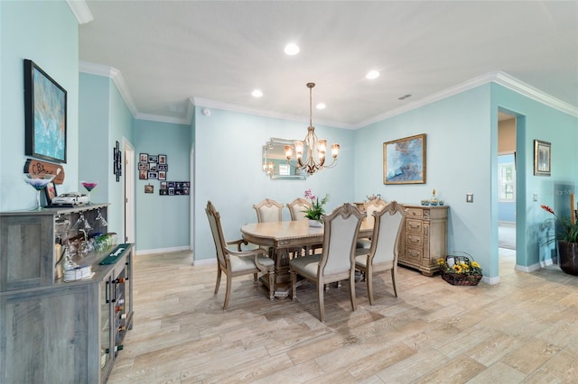 6868 SW 95th Cir, Ocala, FL 34481 - dining room featuring light wood finished floors, a chandelier, baseboards, recessed lighting, and ornamental molding