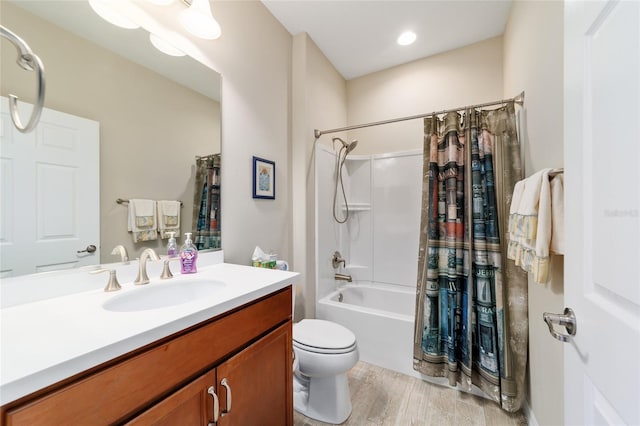 6868 SW 95th Cir, Ocala, FL 34481 - bathroom with wood finished floors, vanity, shower / tub combo, and toilet