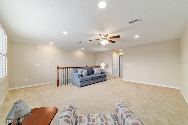 6868 SW 95th Cir, Ocala, FL 34481 - living area with light carpet, a ceiling fan, recessed lighting, and baseboards