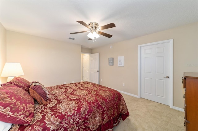 6868 SW 95th Cir, Ocala, FL 34481 - bedroom featuring light colored carpet, ceiling fan, and baseboards