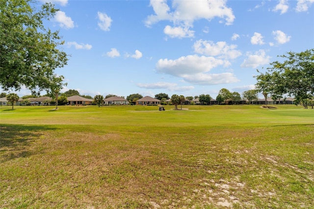 6868 SW 95th Cir, Ocala, FL 34481 - view of home's community with a residential view, a yard, and view of golf course