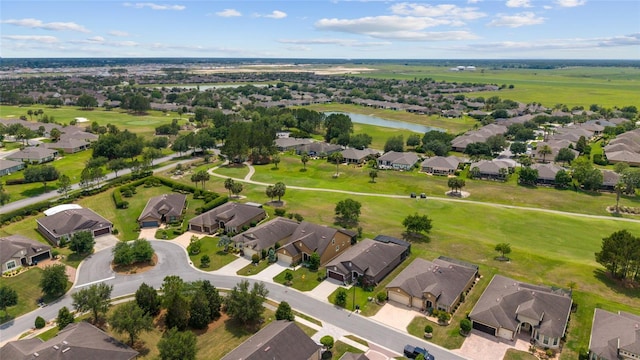 6868 SW 95th Cir, Ocala, FL 34481 - aerial perspective of suburban area featuring a large body of water and a local golf course
