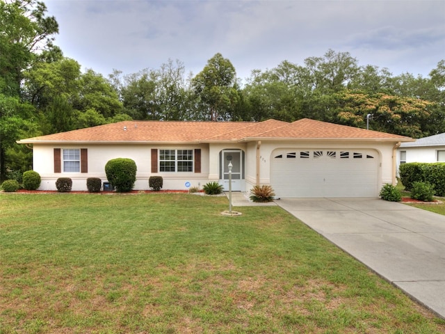 275 W Baker Pl, Citrus Springs, FL 34434 - ranch-style house featuring a garage, stucco siding, driveway, and a front yard