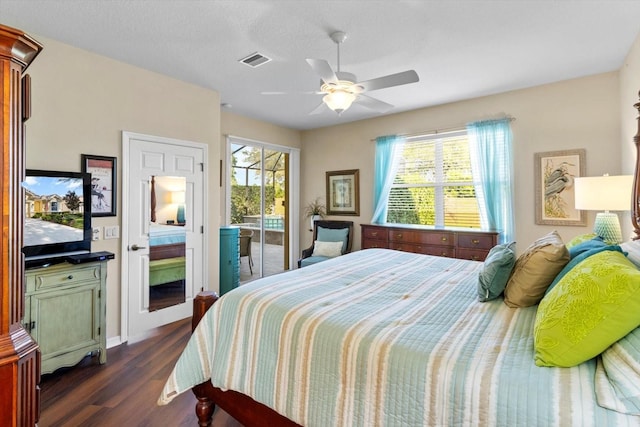 bedroom with access to exterior, dark wood-type flooring, and ceiling fan