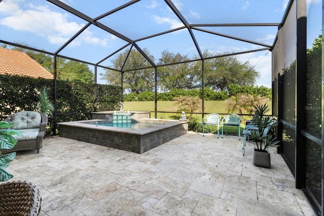 view of patio with an in-ground hot tub and glass enclosure