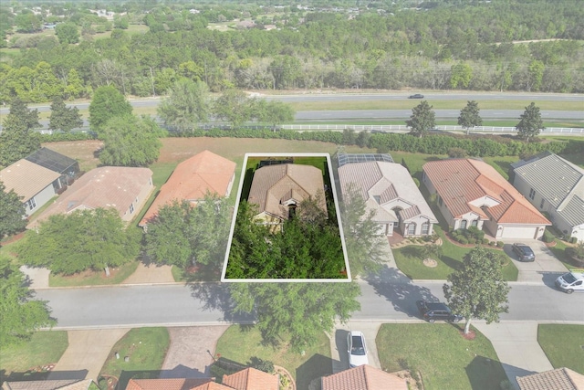 1323 W Skyview Crossing Dr, Hernando, FL 34442 - aerial view of residential area featuring property parcel outlined and a forest