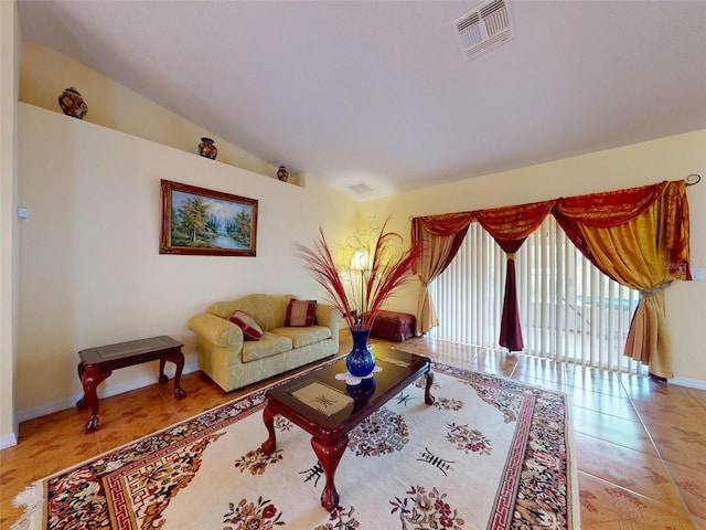 9325 SW 125th Court Rd, Dunnellon, FL 34432 - living room featuring baseboards and lofted ceiling