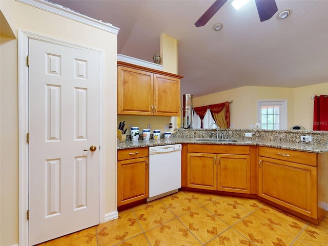 9325 SW 125th Court Rd, Dunnellon, FL 34432 - kitchen featuring white dishwasher, a sink, a ceiling fan, brown cabinets, and light stone countertops