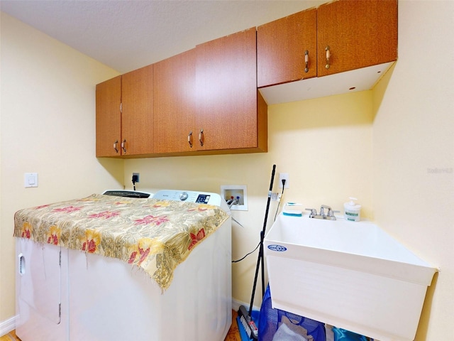 9325 SW 125th Court Rd, Dunnellon, FL 34432 - laundry area featuring cabinet space, washer / clothes dryer, and baseboards