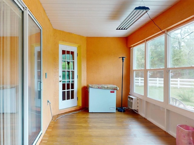 9325 SW 125th Court Rd, Dunnellon, FL 34432 - unfurnished sunroom featuring a wall mounted air conditioner
