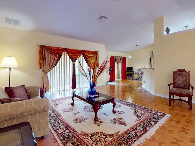 9325 SW 125th Court Rd, Dunnellon, FL 34432 - living room with vaulted ceiling and baseboards