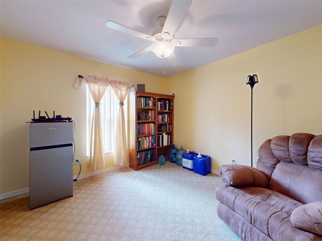9325 SW 125th Court Rd, Dunnellon, FL 34432 - living area with carpet, baseboards, and ceiling fan