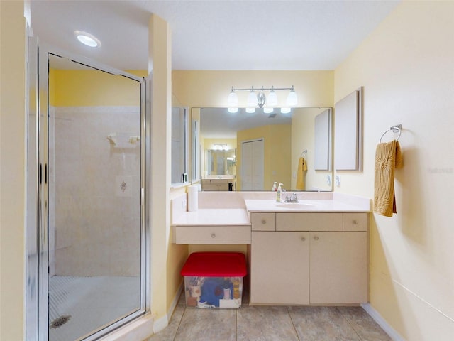 9325 SW 125th Court Rd, Dunnellon, FL 34432 - full bathroom featuring a shower stall, vanity, baseboards, and tile patterned floors