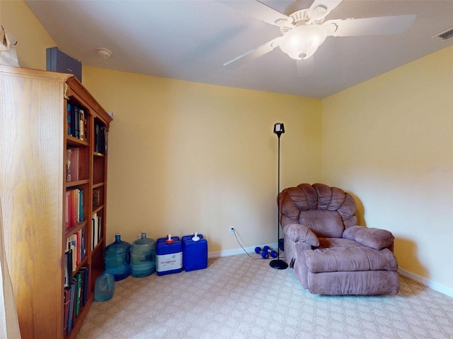 9325 SW 125th Court Rd, Dunnellon, FL 34432 - living area featuring carpet floors, ceiling fan, and baseboards