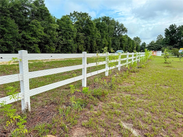 9325 SW 125th Court Rd, Dunnellon, FL 34432 - view of yard featuring a view of trees and a rural view