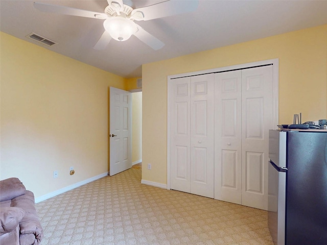 9325 SW 125th Court Rd, Dunnellon, FL 34432 - sitting room with ceiling fan, light carpet, and baseboards