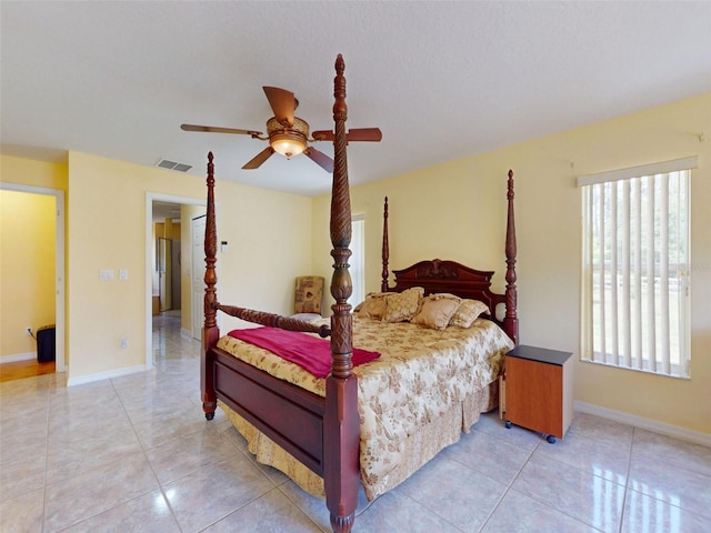 9325 SW 125th Court Rd, Dunnellon, FL 34432 - bedroom featuring light tile patterned flooring and ceiling fan