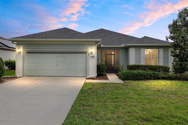 6651 SW 93rd Ct, Ocala, FL 34481 - single story home with concrete driveway, stucco siding, a garage, and a front lawn