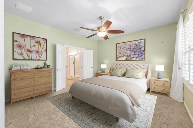 6651 SW 93rd Ct, Ocala, FL 34481 - bedroom featuring light carpet, ceiling fan, and baseboards