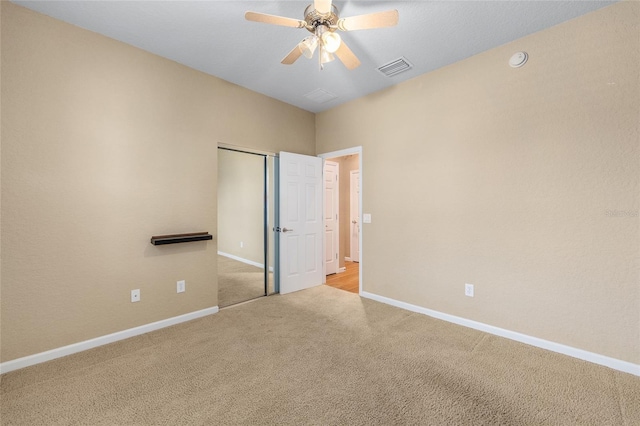 6651 SW 93rd Ct, Ocala, FL 34481 - unfurnished bedroom with light carpet, baseboards, a closet, and ceiling fan