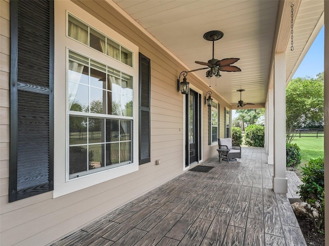 2540 NE 120th St, Anthony, FL 32617 - wooden terrace with a porch and a ceiling fan