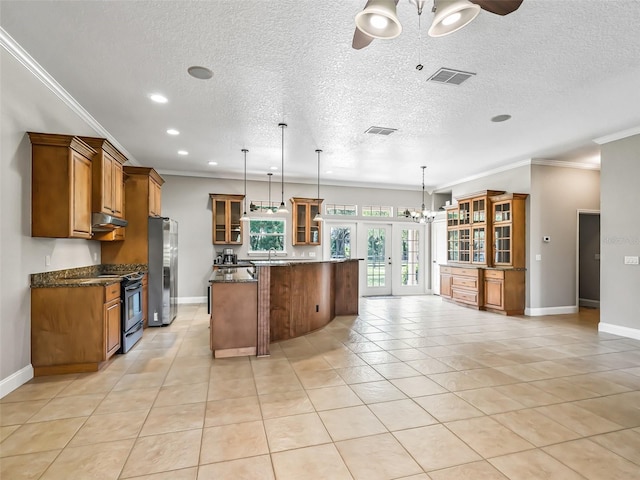 2540 NE 120th St, Anthony, FL 32617 - kitchen featuring electric range, stainless steel fridge, under cabinet range hood, crown molding, and brown cabinetry