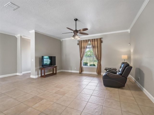 2540 NE 120th St, Anthony, FL 32617 - living area featuring crown molding, ceiling fan, light tile patterned floors, a textured ceiling, and baseboards