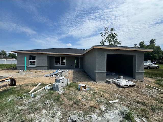 1057 NW 68th Pl, Ocala, FL 34474 - view of front of house featuring a garage