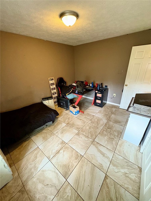 5549 NW 64th St, Ocala, FL 34482 - unfurnished bedroom featuring a textured ceiling