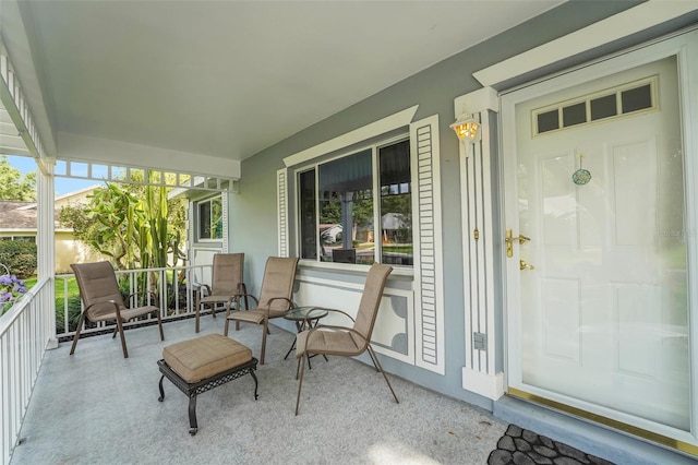 entrance to property with a porch
