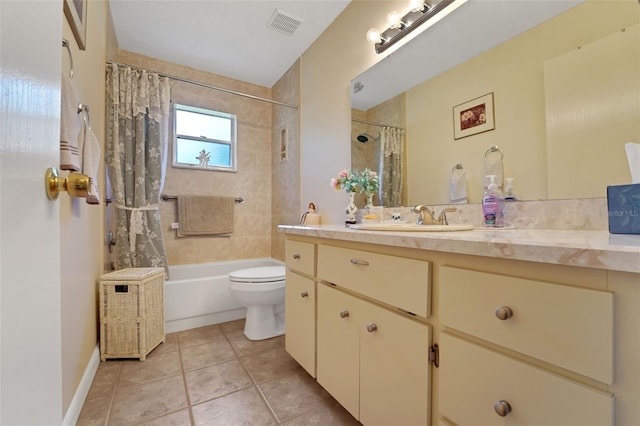 bathroom featuring toilet, vanity, shower / bath combo, and tile patterned floors
