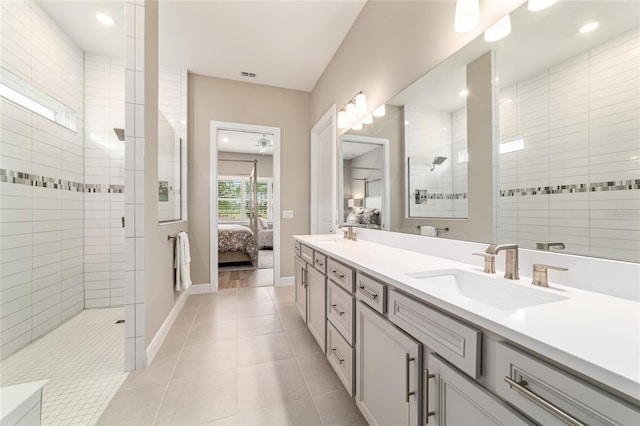 8606 SW 61st Loop, Ocala, FL 34481 - ensuite bathroom featuring walk in shower, double vanity, baseboards, tile patterned floors, and recessed lighting