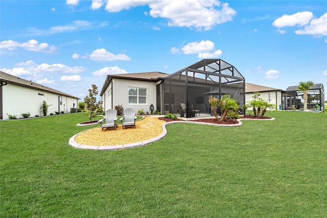 8606 SW 61st Loop, Ocala, FL 34481 - rear view of house featuring a yard, a lanai, and stucco siding