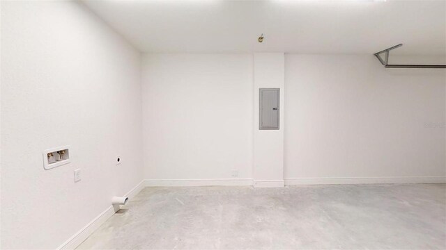 24128 SW S Lakes Ct, Dunnellon, FL 34431 - empty room featuring electric panel, concrete flooring, and baseboards