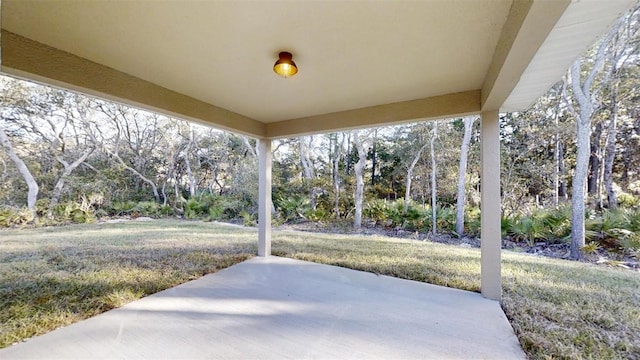 24128 SW S Lakes Ct, Dunnellon, FL 34431 - view of patio featuring view of wooded area