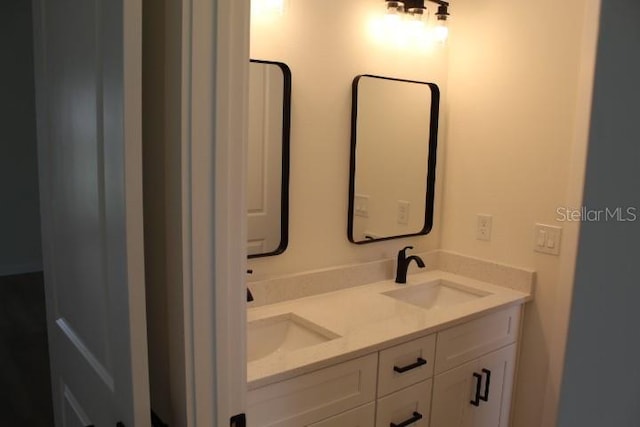 bathroom with double vanity