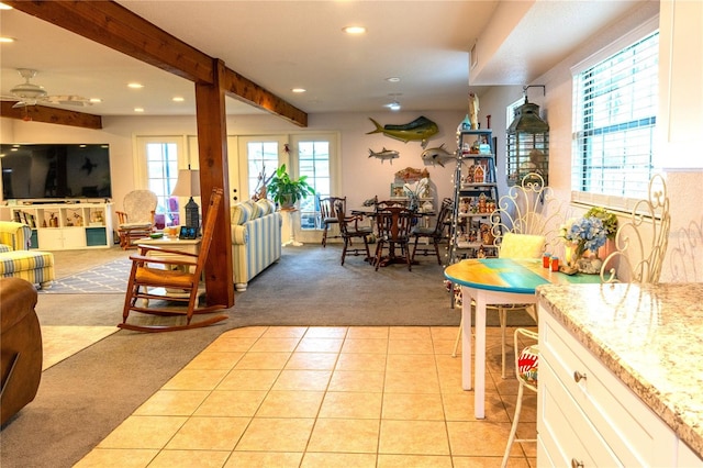 7023 W Riverbend Rd, Dunnellon, FL 34433 - living area featuring light carpet, recessed lighting, ceiling fan, and light tile patterned floors