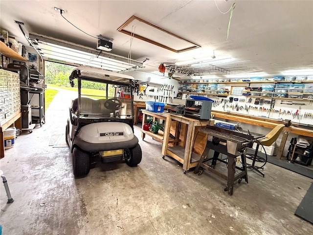 7023 W Riverbend Rd, Dunnellon, FL 34433 - garage with a workshop area and a garage door opener