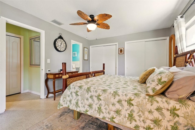 3020 E Scofield St, Inverness, FL 34453 - bedroom with multiple closets, dark aggregate flooring, baseboards, and ceiling fan