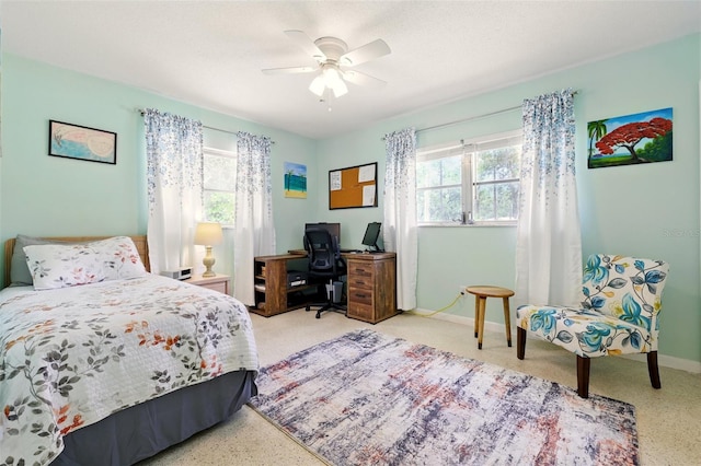 3020 E Scofield St, Inverness, FL 34453 - bedroom featuring multiple windows, a desk, baseboards, and ceiling fan