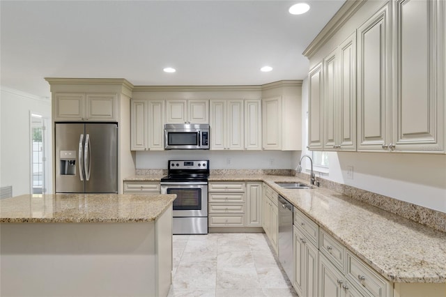 4010 SW 7th Avenue Rd, Ocala, FL 34471 - kitchen featuring appliances with stainless steel finishes, a sink, ornamental molding, recessed lighting, and light stone countertops