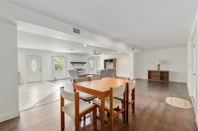 4010 SW 7th Avenue Rd, Ocala, FL 34471 - dining space with baseboards, recessed lighting, wood finished floors, and a fireplace