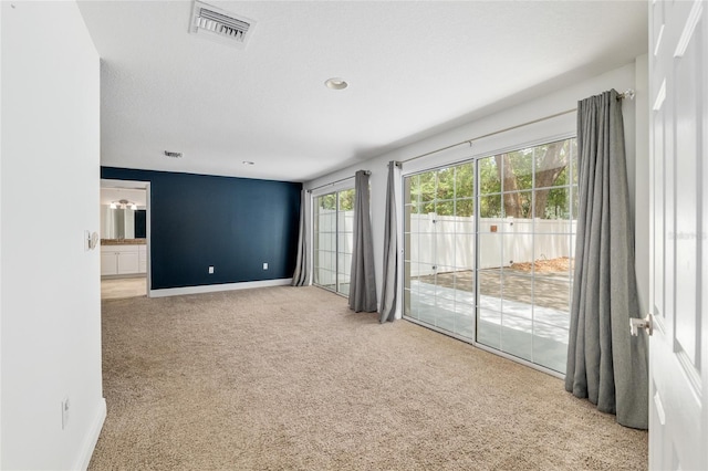 4010 SW 7th Avenue Rd, Ocala, FL 34471 - carpeted empty room featuring plenty of natural light and baseboards