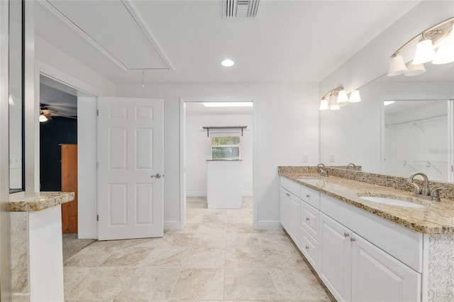 4010 SW 7th Avenue Rd, Ocala, FL 34471 - full bath with double vanity, recessed lighting, and baseboards