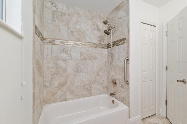 4010 SW 7th Avenue Rd, Ocala, FL 34471 - bathroom featuring shower / bathtub combination and a closet