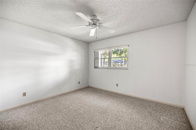 9667 SW 94th Ct Unit C, Ocala, FL 34481 - carpeted spare room featuring a textured ceiling, a ceiling fan, and baseboards