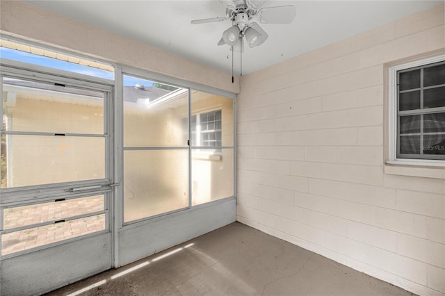 9667 SW 94th Ct Unit C, Ocala, FL 34481 - unfurnished sunroom featuring ceiling fan