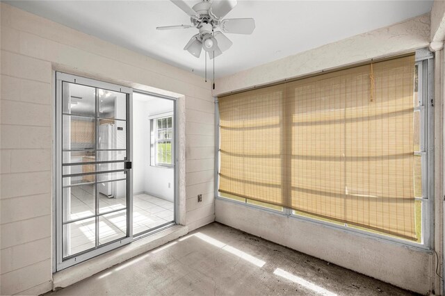 9667 SW 94th Ct Unit C, Ocala, FL 34481 - doorway with ceiling fan