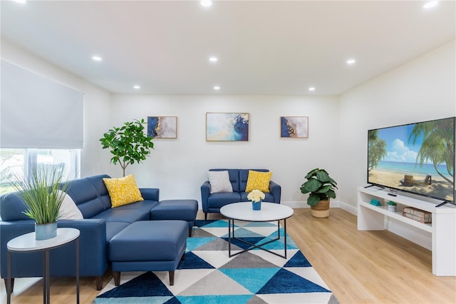 8622 Baylor Cir, Orlando, FL 32817 - living room featuring wood finished floors, recessed lighting, and baseboards