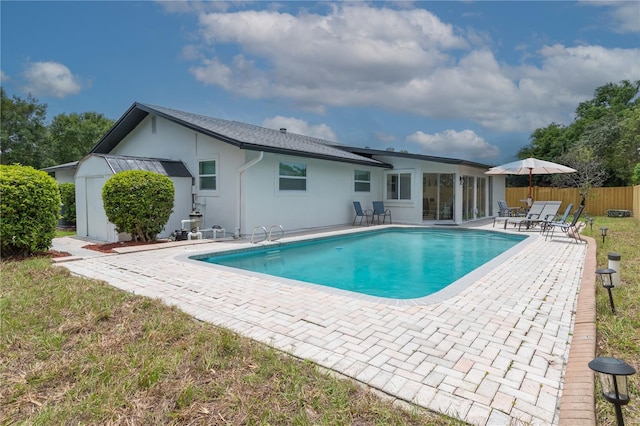 8622 Baylor Cir, Orlando, FL 32817 - view of swimming pool featuring a patio and fence